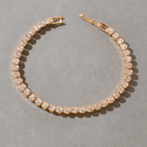 PULSEIRA GRAVADA COM STRASS DOURADA